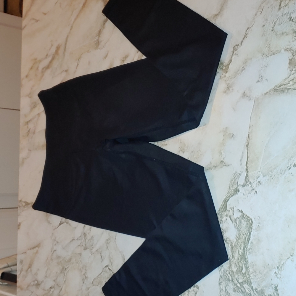 Size 2 black leggings with slight camo pattern